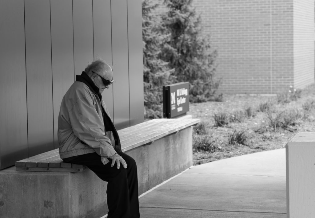 Dad at eye appointment U of M medical center photographed by Dailyn Matthews Adventure Photographer