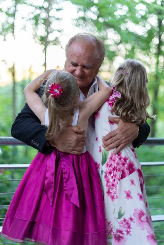 Papa with his granddaughters photographed by Dailyn Matthews Adventure Photographer