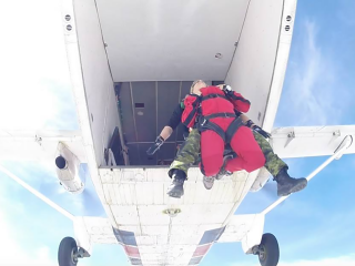 Adventure Photographer Dailyn Matthews skydiving with the Canadian Army Skyhawks