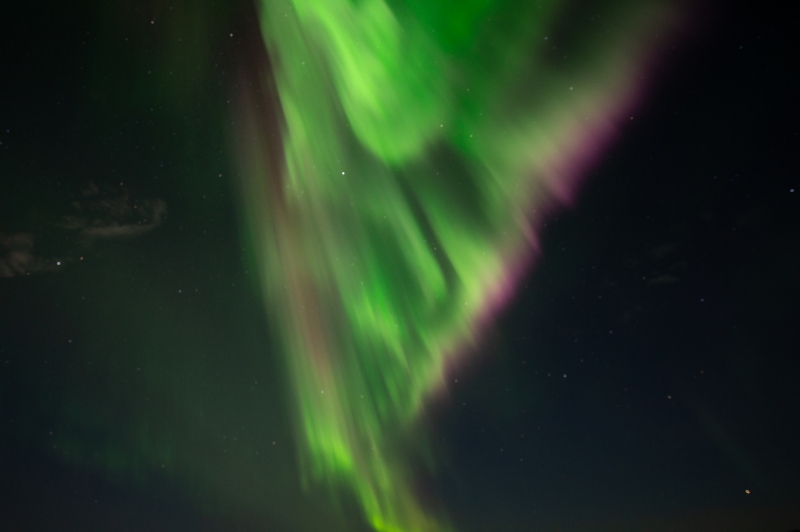 Aurora Borealis / Northern Lights corona with pink  in Iceland photographed by Adventure Photographer, Dailyn Matthews