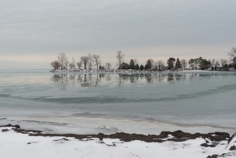 A frozen winter day on the Detroit River in Michigan photographed by Adventure Photographer, Dailyn Matthews