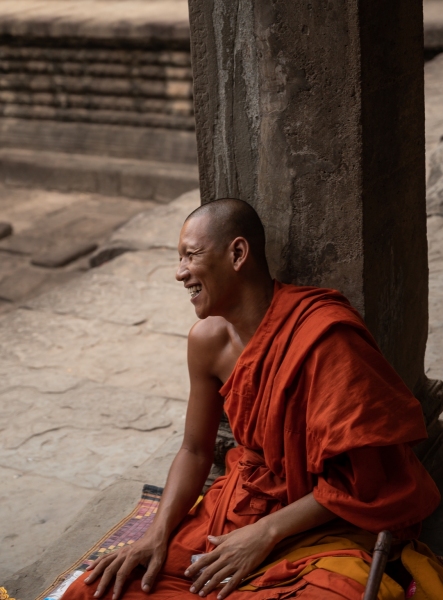 Jubilant Buddhist monk in Angkor Wat Temple, Siem Reap, Cambodia photographed by Adventure Photographer, Dailyn Matthews