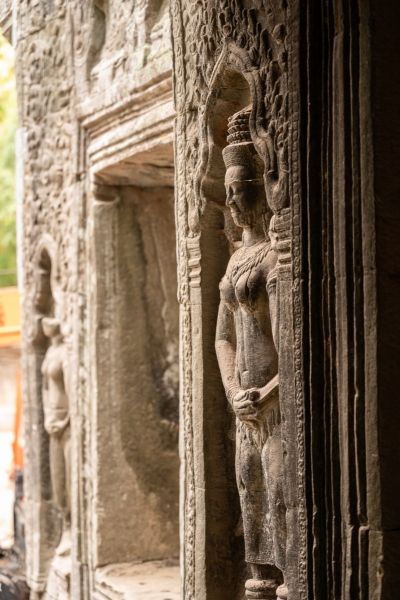 Devata carved in a Cambodian temple wall photographed by Adventure Photographer, Dailyn Matthews