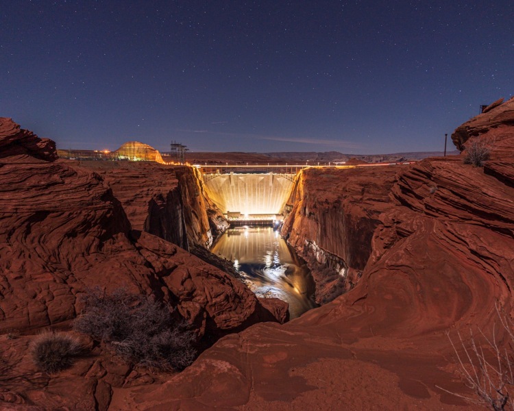 Glen Canyon Dam connects Lake Powell & the Colorado River in Arizona photographed at night by Adventure Photographer, Dailyn Matthews