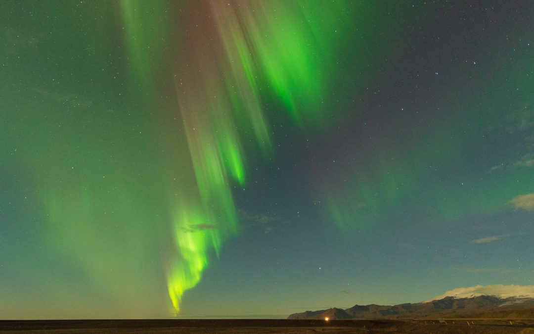Standing under the Aurora Borealis in Iceland